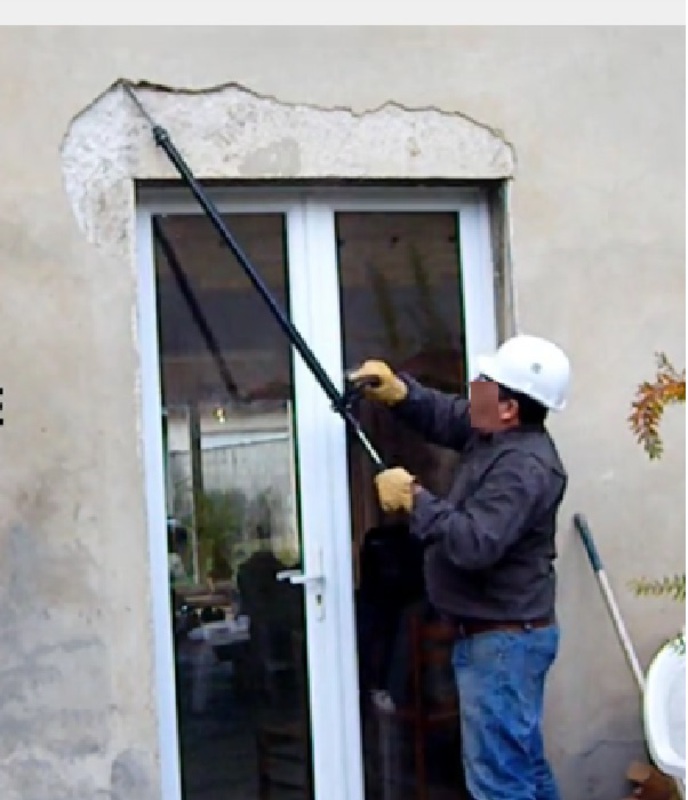 Canne à décrépir les murs